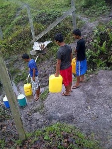 PK children fetching water